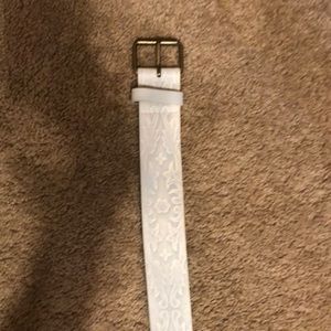 All white w design polyurethane belt. Size 15.